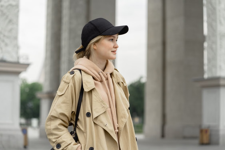 Man wearing a cap with a matching tracksuit, showing caps outfit ideas for 2026