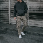 Man wearing cargo pants and hoodie showing cargos outfit ideas for 2026